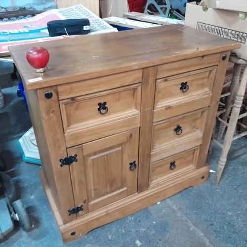 1015 - A large heavy solid wood hall table with 5 drawer compartments filled with miscellaneous items unche... 