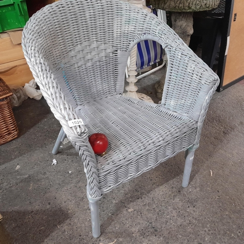 1020 - A wicker tub chair in a painted grey finish.