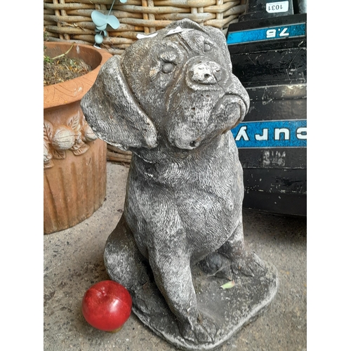 1030 - A large reconstituted stone garden of dog. Good weight to this piece.