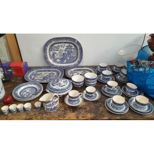 1044 - Star Lot: A very large collection of blue and white antique porcelain including three large willow p... 