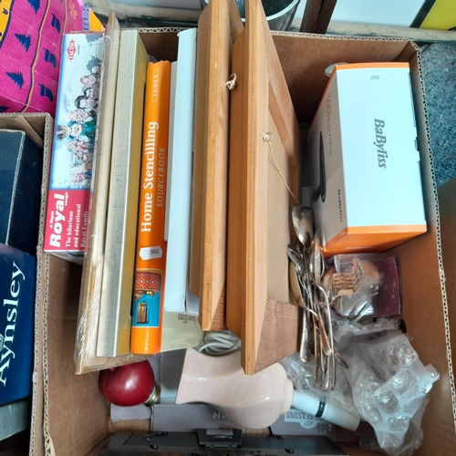 1049 - A mixed lot including cutlery, a new Babyliss travel hair dryer, and new frames.