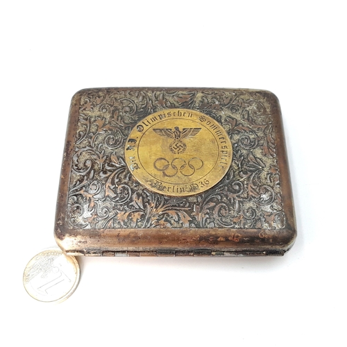 1053 - Star lot : A fascinating 1936 German Olympics double sided metal cigarette case, Berlin. Stamped 