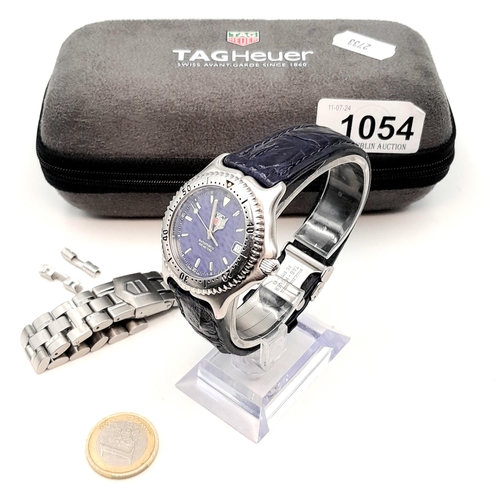 1054 - Star Lot: A superb TAG Heuer Swiss made mens wrist watch - Automatic, sapphire crystal and stainless... 