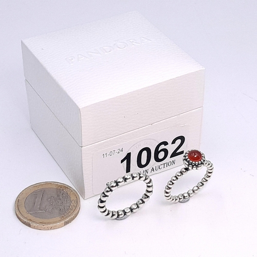 1062 - Two 925 sterling silver Pandora rings in one original box. Both size K.