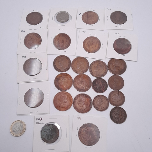 1067 - A collection of vintage coinage (25) including 12 carded examples of note is a 1823 Hibernia Irish c... 