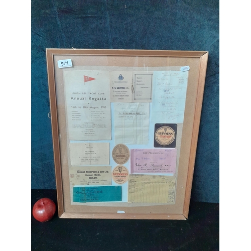 971 - A collage of Pub / Nautical themed ephemera. Housed in a wooden frame behind glass.