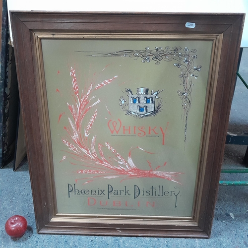 998 - A large advertising print featuring Phoenix Park Distillery. Housed in a wooden gilt frame behind gl... 