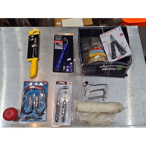 739 - A box of new box tools Includes Stanley handsaw, Livarno Lux LED torch, Livarno booster cables, Powe... 