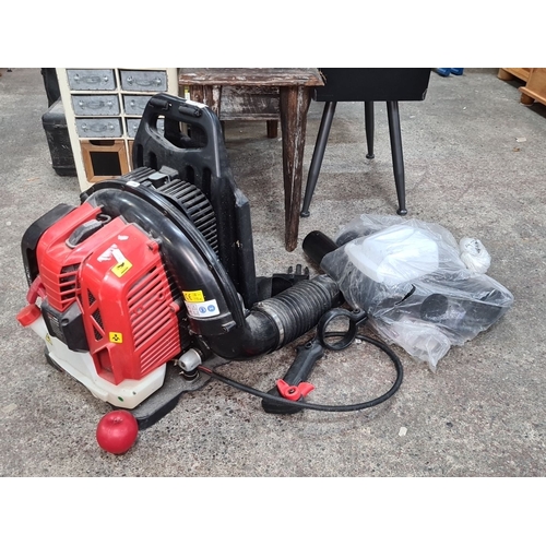 755 - BU-KO Power leaf blower, model BU-KO-7600. The blower features 76cc displacement, 2.2kW output power... 