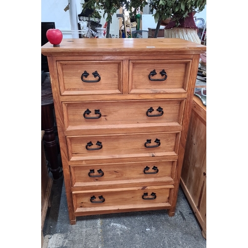 776 - Vintage wooden chest of drawers. Comprises six drawers with metal handles. Handcrafted with a natura... 