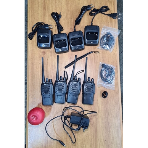 781 - Four Baofeng UHF FM transceivers Walkie talkies , Model BF-888S. Includes charging docks and headset... 