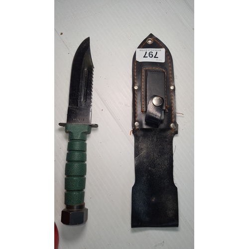 797 - Survival knife with green handle and serrated black blade, marked 