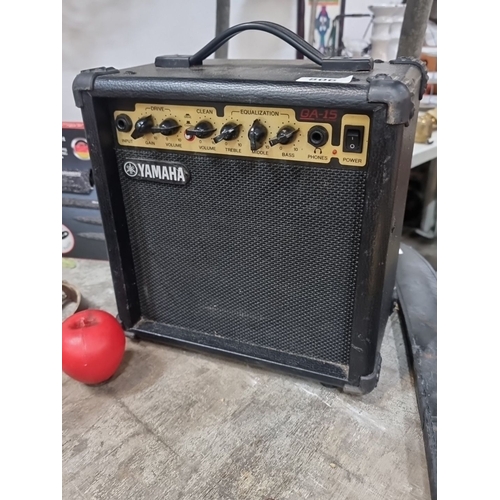 806 - Yamaha GA-15 guitar amplifier, black. Features a front control panel with gain, volume, treble, midd... 