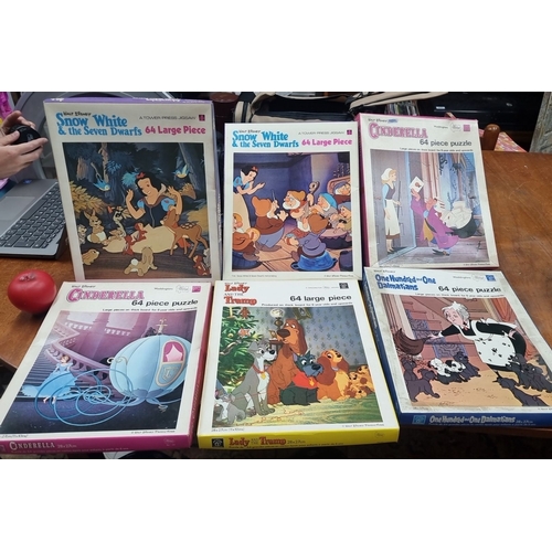 816 - Set of six vintage Walt Disney 64-piece jigsaw puzzles. The puzzles feature scenes from 