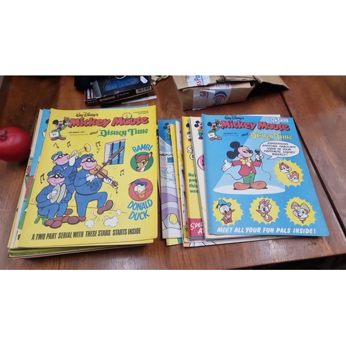 817 - A large Collection of vintage Walt Disney's Mickey Mouse comic books from August 1977. Features char... 