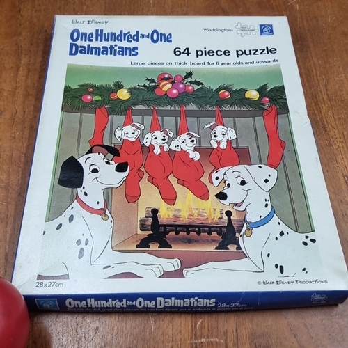 823 - A vintage Walt Disney One Hundred and One Dalmatians 64-piece puzzle by Waddingtons. Dimensions 28x2... 