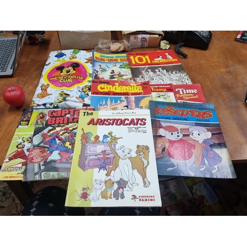 830 - Mixed lot of nine vintage comics and picture specials. Titles include 