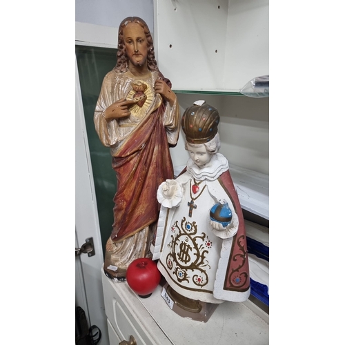 843 - Pair of religious statues depicting the Sacred Heart of Jesus and the Infant Jesus of Prague. The st... 