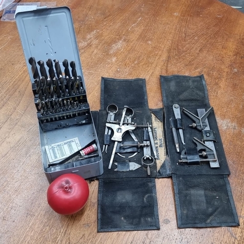 891 - Two mixed set of tools and drill bits. Includes precision measuring instruments by Brown & Sharpe, a... 