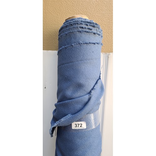 372 - A large bolt / roll of hardwearing furniture upholstery fabric in cornflour blue. Ideal for re-uphol... 