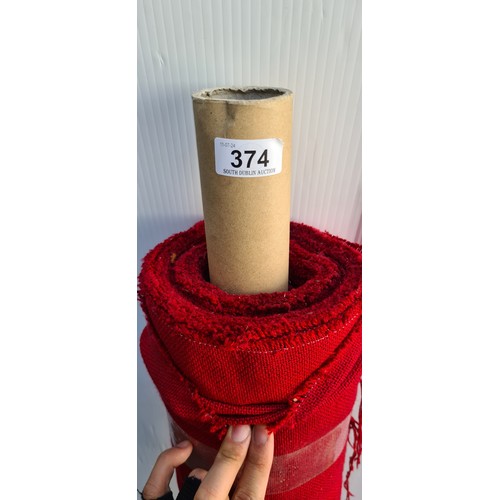 374 - A large bolt / roll of hardwearing furniture upholstery woven fabric in deep red. Ideal for re-uphol... 