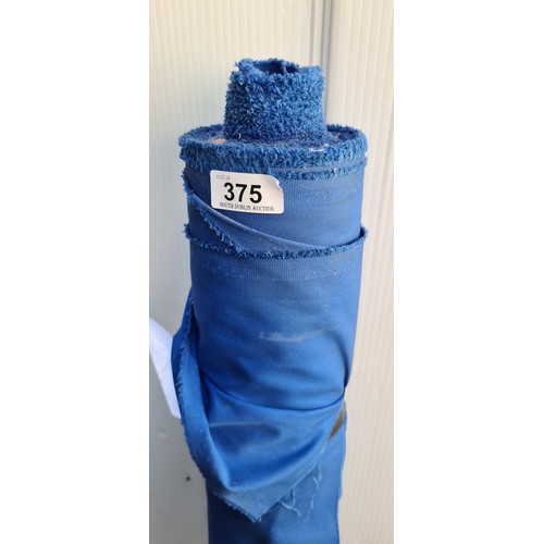 375 - A large bolt / roll of cotton fabric in a bright blue shade.