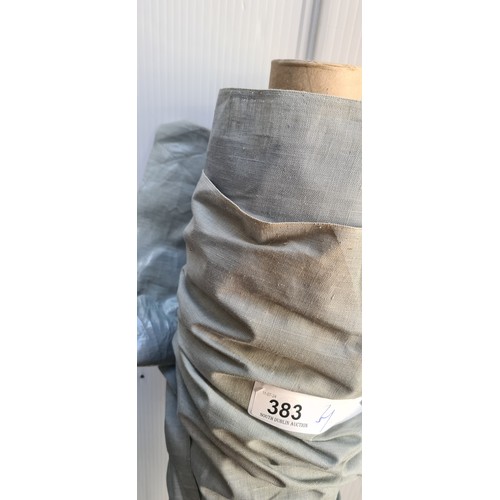 383 - A large bolt / roll of furniture upholstery fabric in grey with waterproof backing. Ideal for re-uph... 