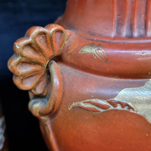 138 - A handsome pair of large antique ceramic Japanese vases featuring lovely hand painted floral and fol... 