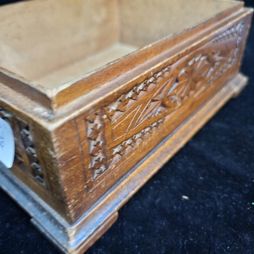 150 - A beautiful and intricately carved wooden storage box with an Art Nouveau hammered pewter top.