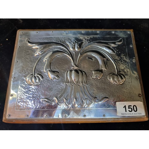 150 - A beautiful and intricately carved wooden storage box with an Art Nouveau hammered pewter top.