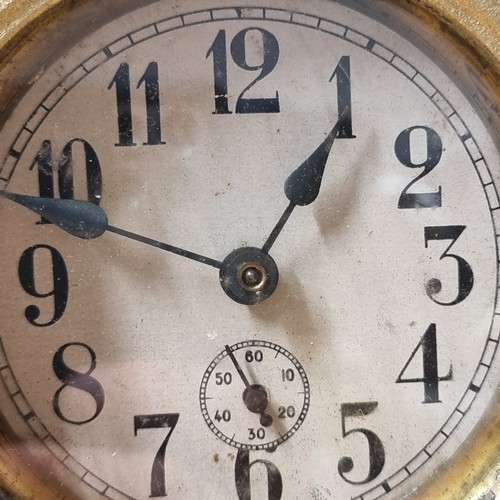 190 - A beautiful vintage cast gilt metal clock adorned with a poised female to top and finished in a gilt... 