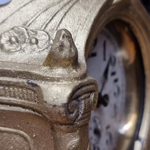 190 - A beautiful vintage cast gilt metal clock adorned with a poised female to top and finished in a gilt... 