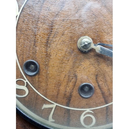 198 - Two  antique mahogany art deco mantle clocks. Including an eight day and chiming example.