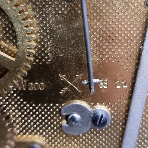 198 - Two  antique mahogany art deco mantle clocks. Including an eight day and chiming example.