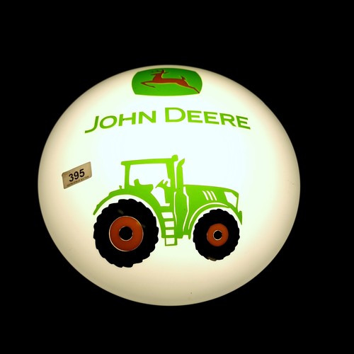 395 - A wall mounting light advertising John Deere.