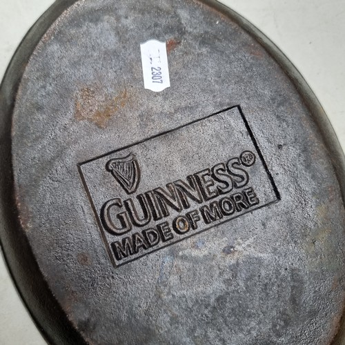 403 - A 'Guinness Made of More' Cast Iron Skillet Oval Frying Pan.