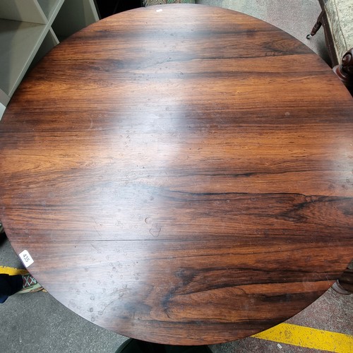 435 - Star lot : A gorgeous Irish Georgian Rosewood pedestal table with a round top and intricately carved... 