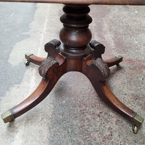 480 - Star lot : A gorgeous 19th-century Regency mahogany cellarette with pedestal base, brass castor whee... 