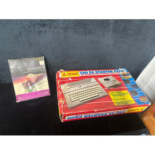 937 - Star lot : An Atari 130 XE starter pack, an introduction to home computing along with an invitation ... 