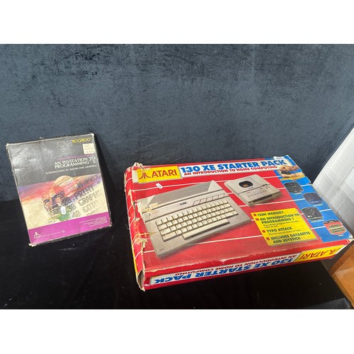 937 - Star lot : An Atari 130 XE starter pack, an introduction to home computing along with an invitation ... 