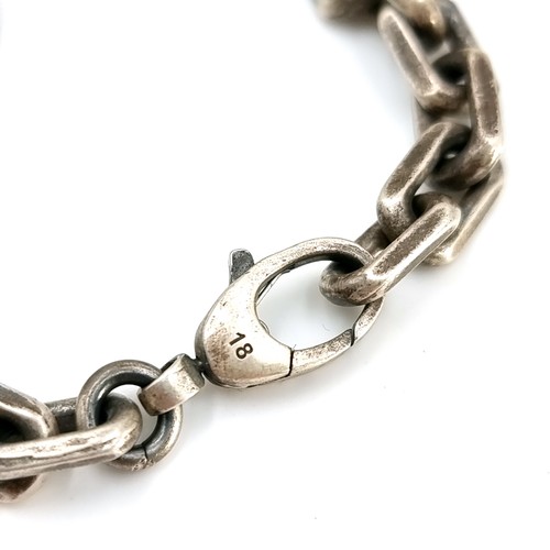 24 - Star Lot : An original designer Gucci sterling silver chain link bracelet set with lobster clasps. W... 