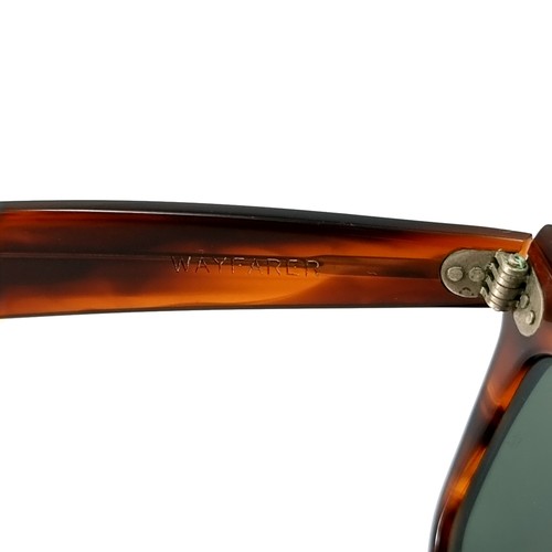 52 - A pair of Ray-Ban faux tortoise shell framed sunglasses marked USA to stem.