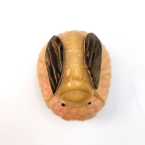 502 - A super bone antique carved Netsuke (two holes) set with a nicely carved mounted fly insect. Dimensi... 