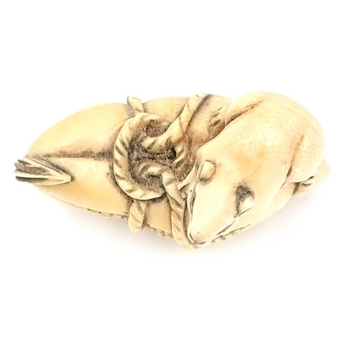 513 - A super carved original Japanese antique Netsuke (two holes) depicting a rat mounted on a sweetcorn ... 