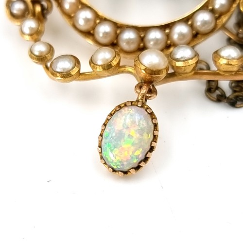 533 - A most attractive antique pearl set brooch with a super fire opal drop pendant. Together with pin sa... 