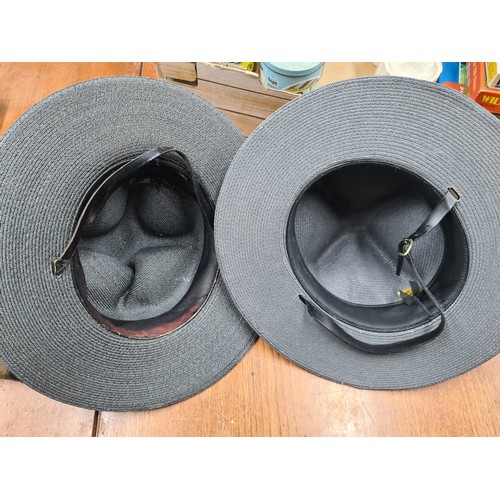 908 - Two fascinating New York State police hats.