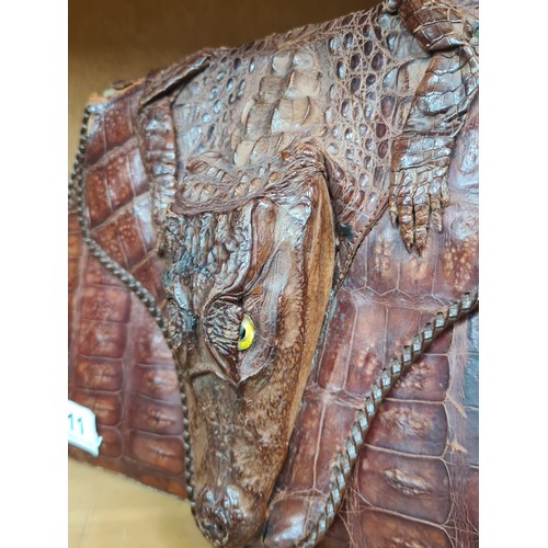 911 - A very unusual alligator taxidermy handbag.