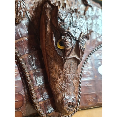 911 - A very unusual alligator taxidermy handbag.