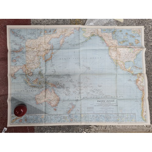 946 - Three vintage binders of National Geographic world maps from the 1940's and 1950's. Approx. over 40 ... 