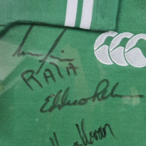 1005 - Star Lot: A very large framed early 2000's signed Irish rugby jersey. Brian O'Driscoll and Paul O'Co... 